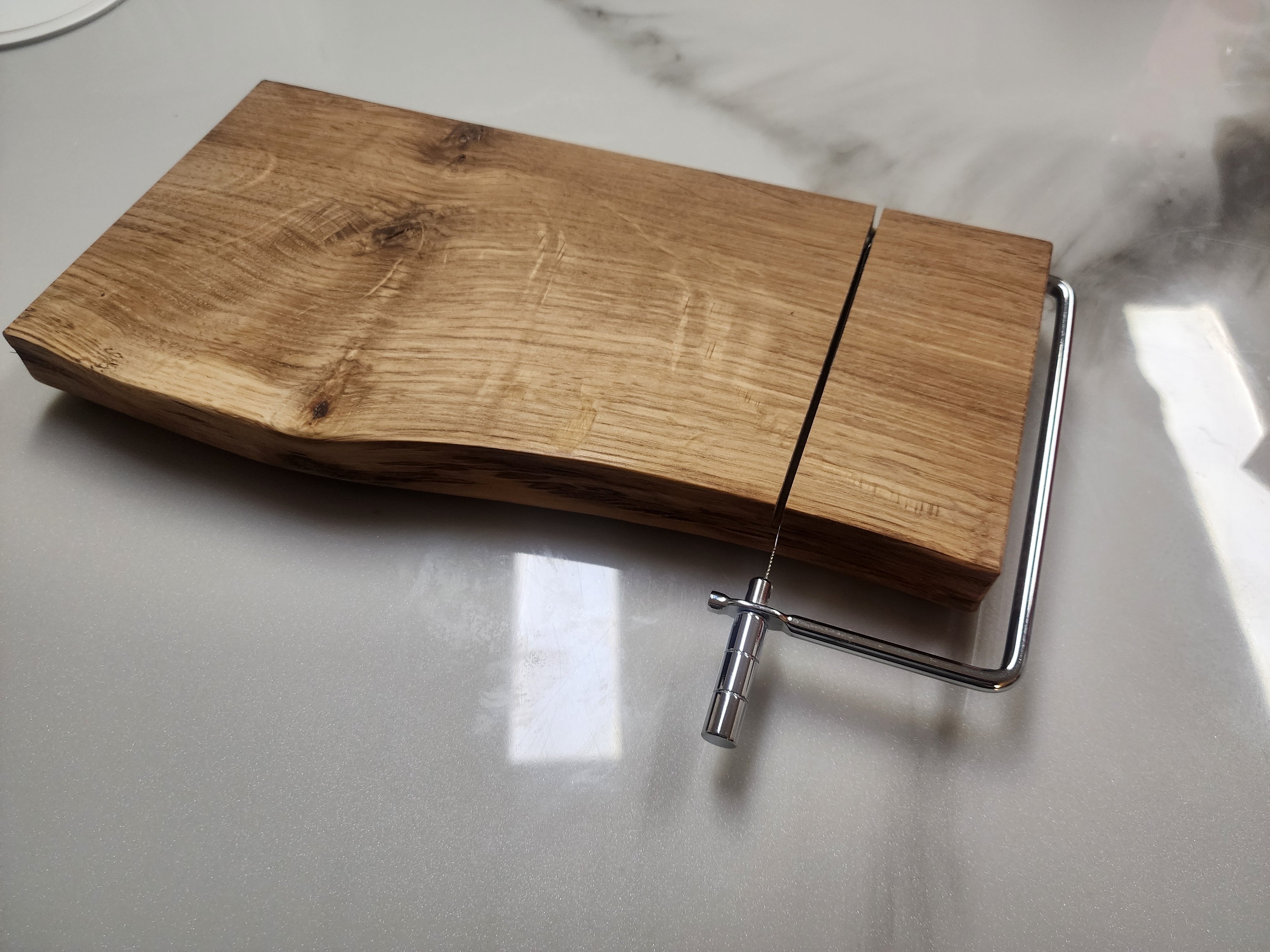 Live edge cheese slicing board