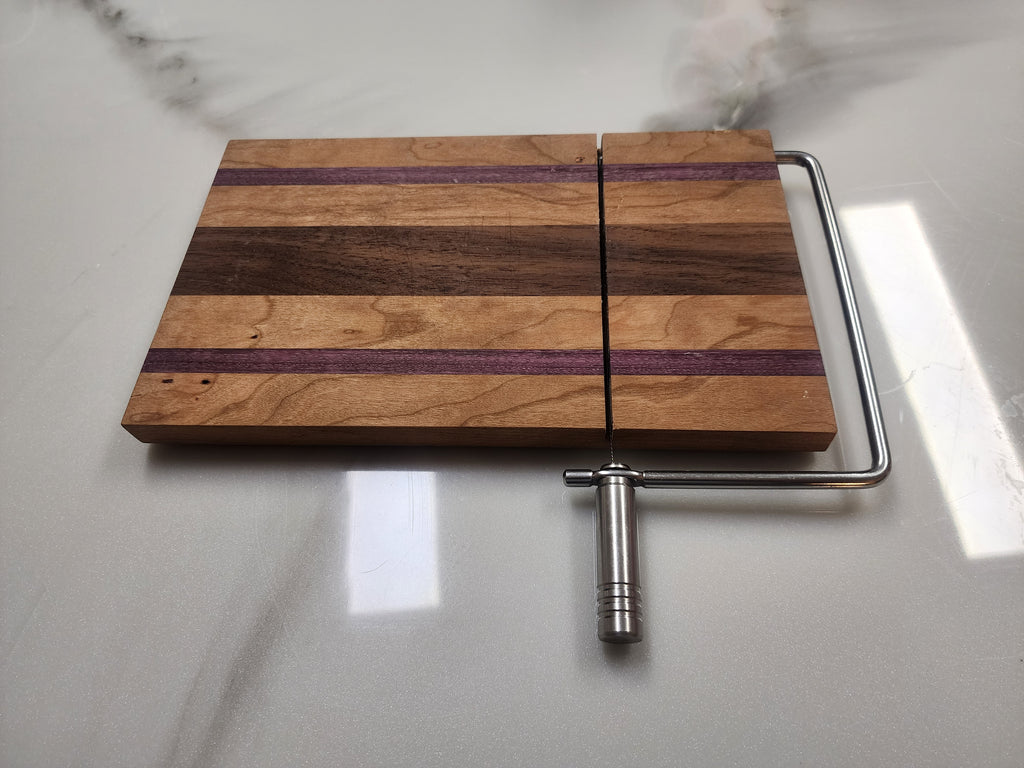 Edge grain cheese slicing board