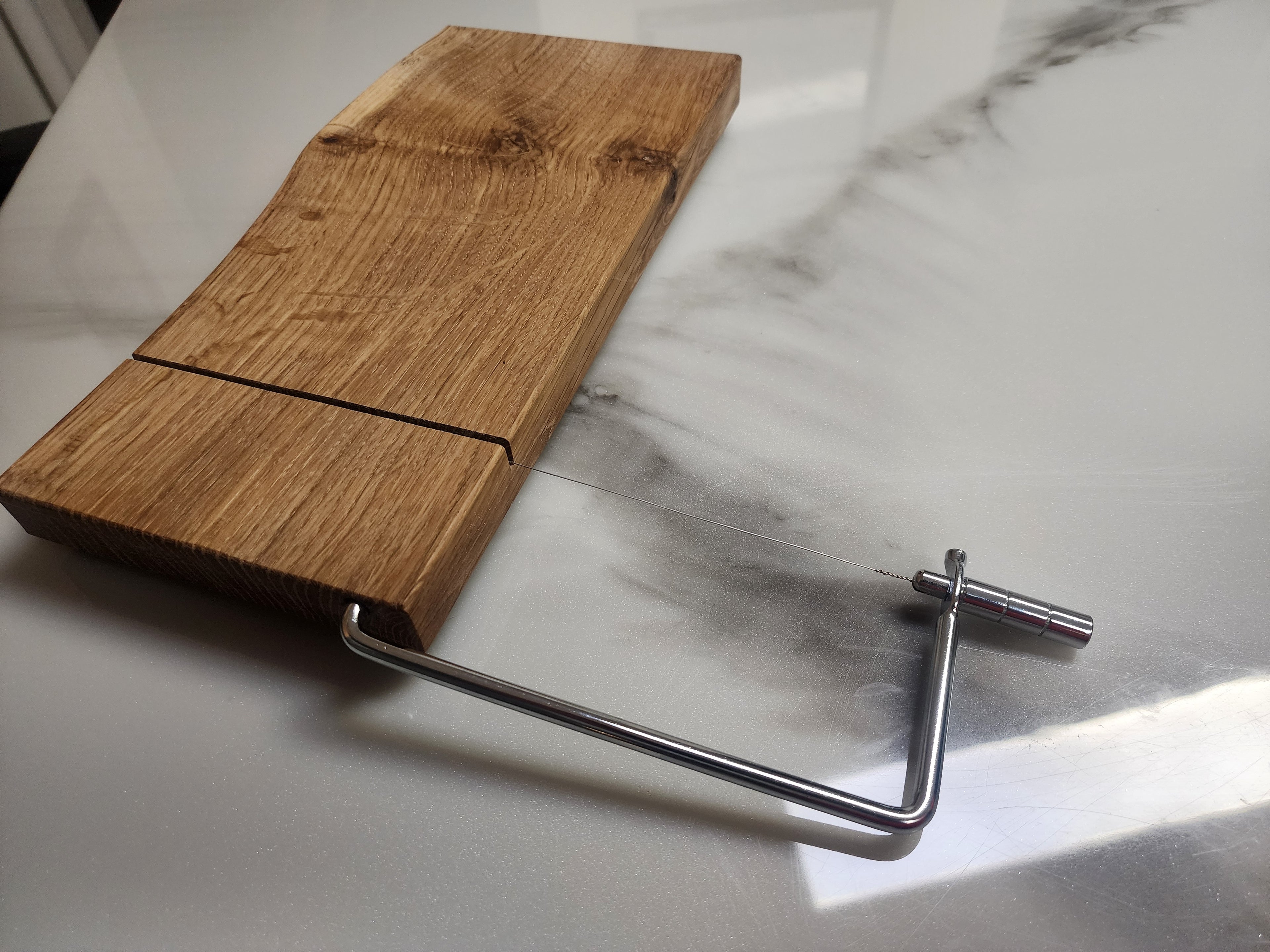 Live edge cheese slicing board
