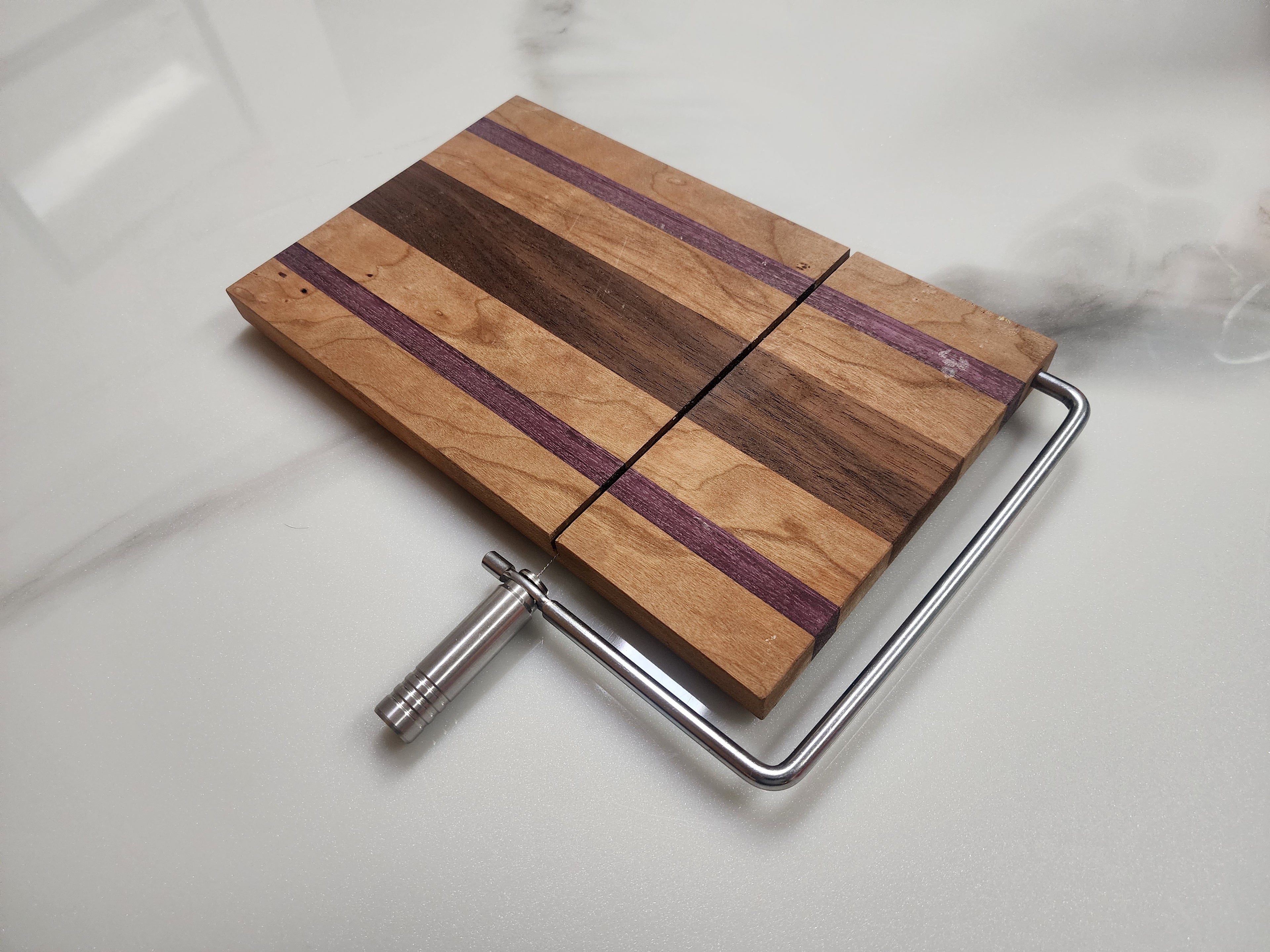 Edge grain cheese slicing board