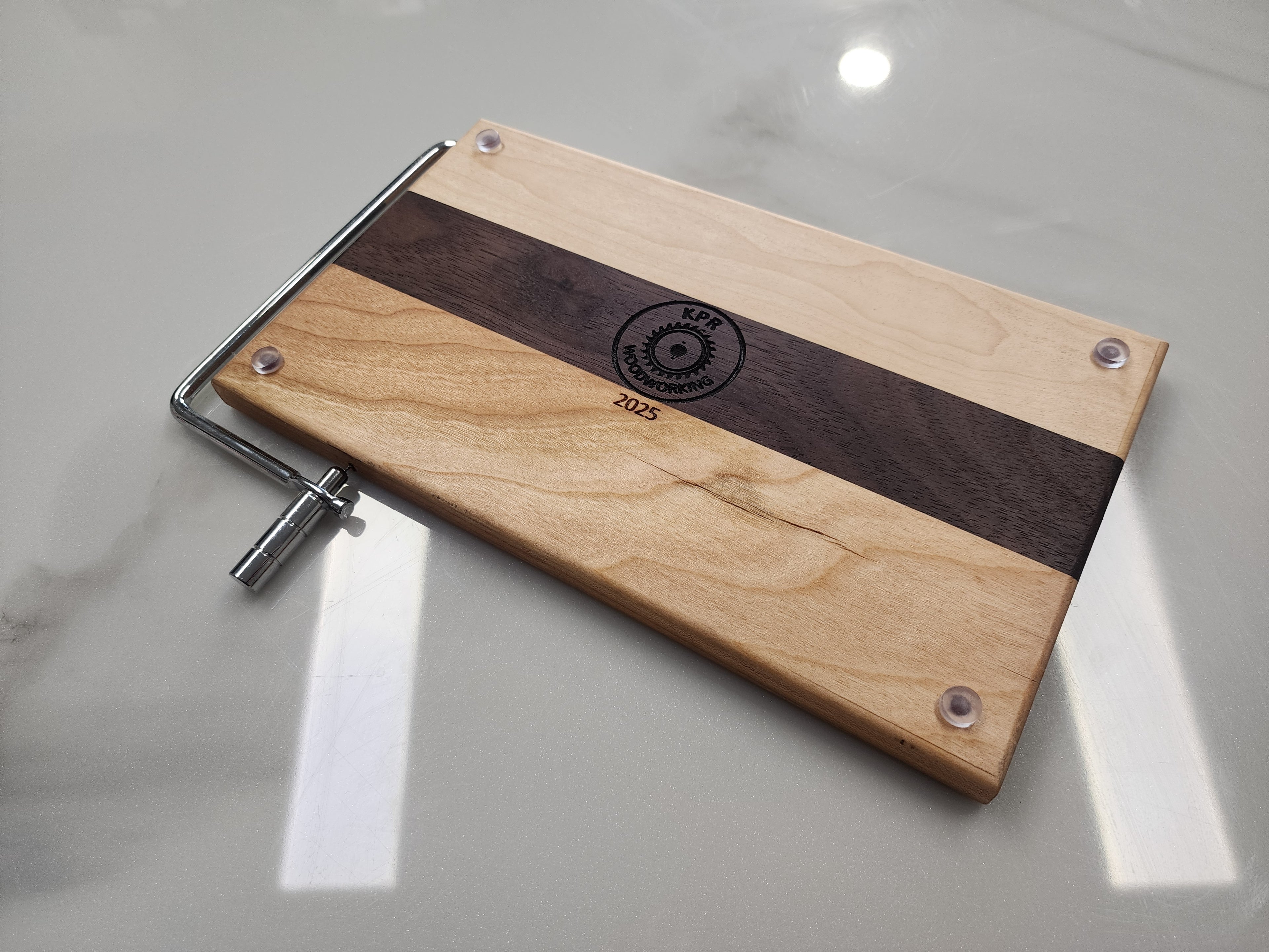 Edge grain cheese slicing board
